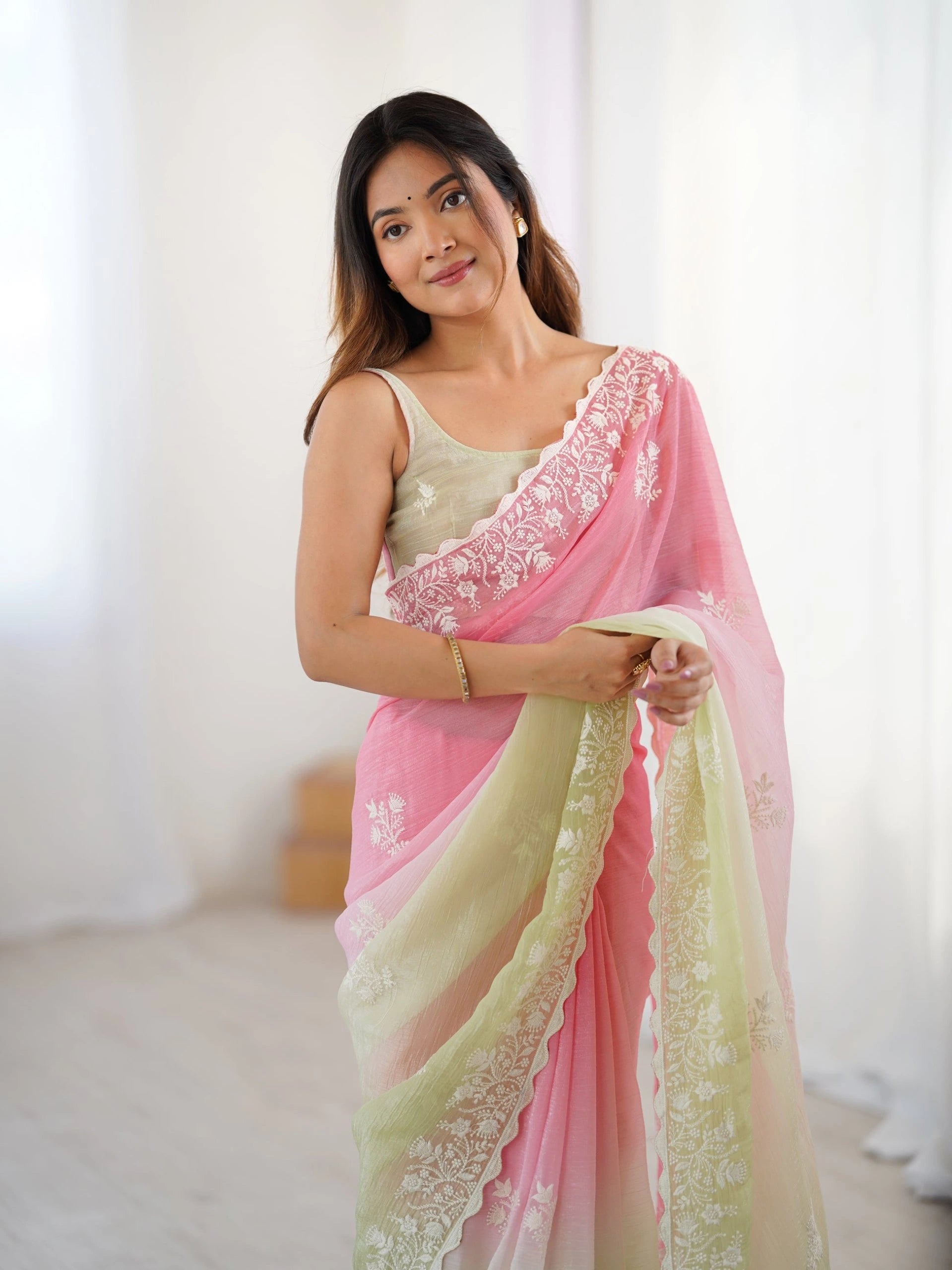 embroidered chiffon scalloped saree in a pink and light green